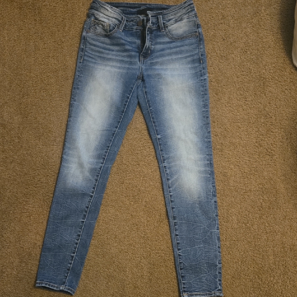 Blue Skinny Jeans with Tapered Leg and Vintage Wash